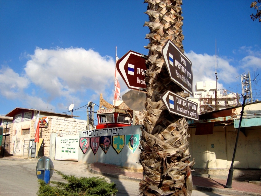 D.Peschel - Israeli tourist signs on Shuhada Street - Hebron - 281214