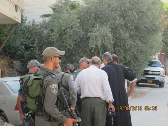 19.08.2015 priest negotiate with soldiers Beit Ouna EAPPI EOD