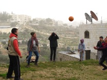 08.01.16. Hebron. EAs playing volleyball with children in Wadi al Hussein valley. EAPPI/E. Röst